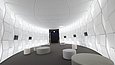 Futuristisch anmutender Raum in weiß gehalten mit besonderer Fassadengestaltung