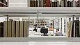 Several visitors of the reading room of the Archäologisches Zentrum