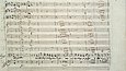 Sheet of music with notes and text