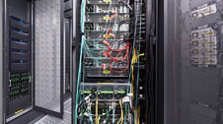 View of a room full of computers and cables