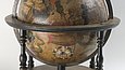 Colored globe with wood stand