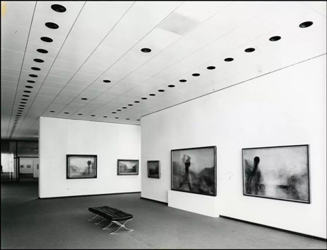 Black and white photograph of an exhibition