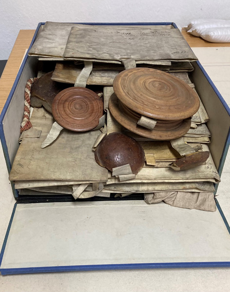 Boxes of documents Cardboard box full of historical papers
