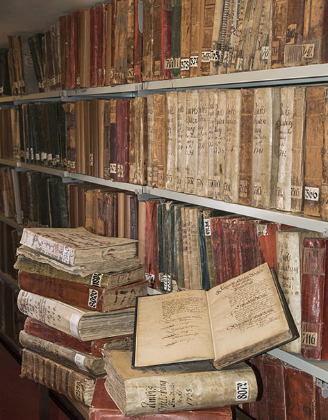 Shelfs full of ancient books