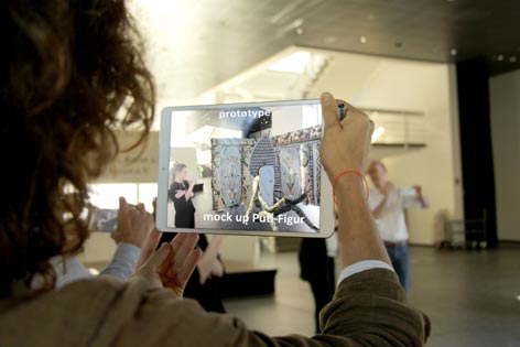 A woman uses an augmented reality tool 