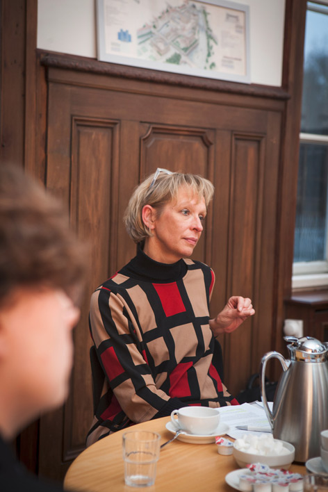 A woman at a round table