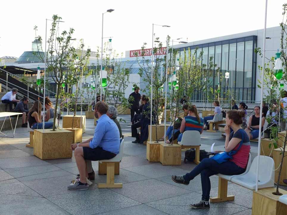 People sitting on a square