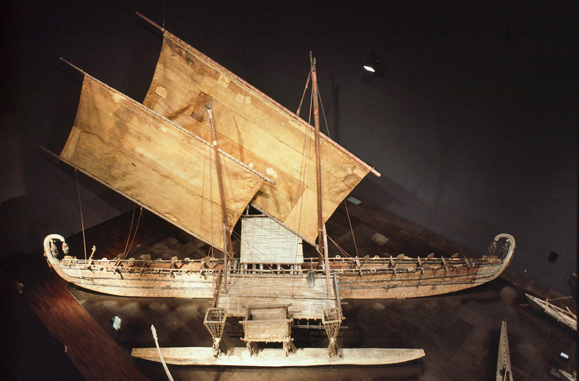 Wooden boat with two rectangular sails