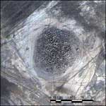 Satellitenbild eines Hügels bei Uruk 2005 Tagung "Kulturgut in Gefahr"; Podiumsdiskussion