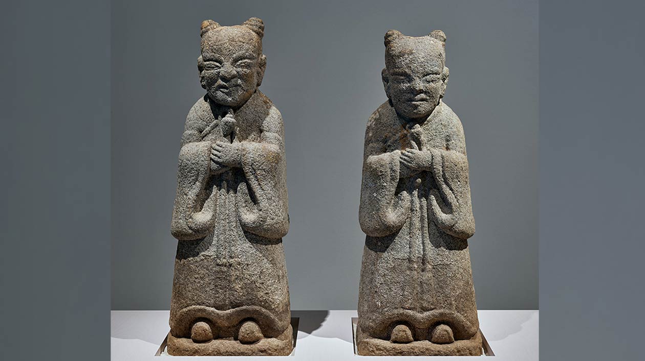 Two stone sculptures from the Asian cultural area.